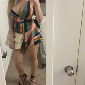 Abstract multi colored romper. Spaghetti strap. Low cut. Short  romper